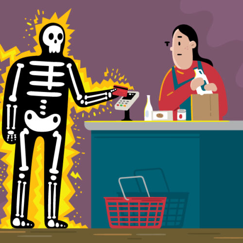 A shopper being electrocuted at the grocery store check out counter after inserting his credit hard into the reader