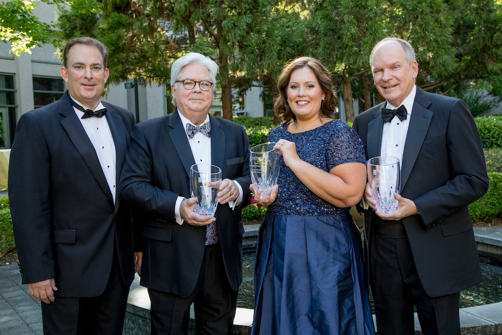 Dean Benjamin C. Ayers stands with award recipients Steve Goodroe