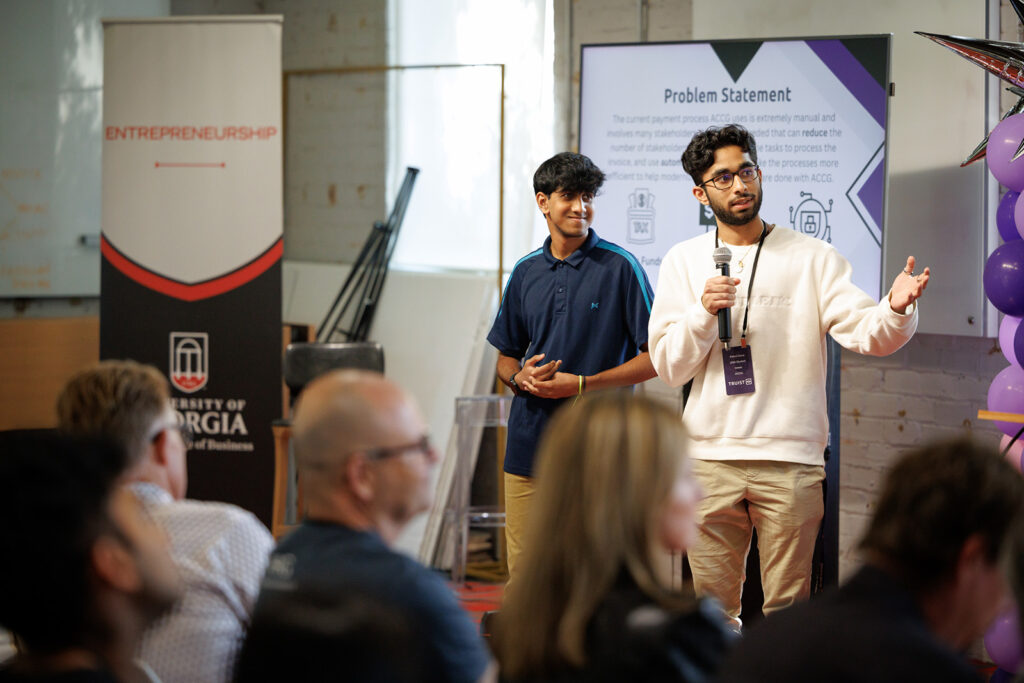 Students present their AI solutions to the crowd gathered at the immersive learning experience created and hosted by Truist. Students present their AI solutions to the crowd gathered at the immersive learning experience created and hosted by Truist.
