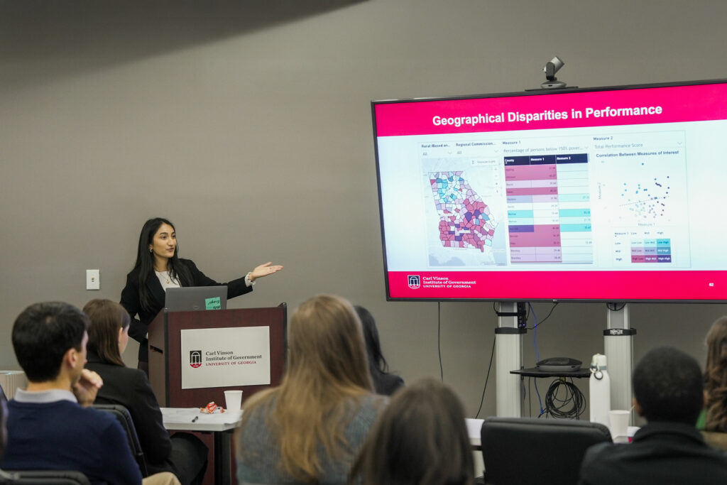 Shriya Garg presents her research findings at the UGA Carl Vinson Institute of Government.