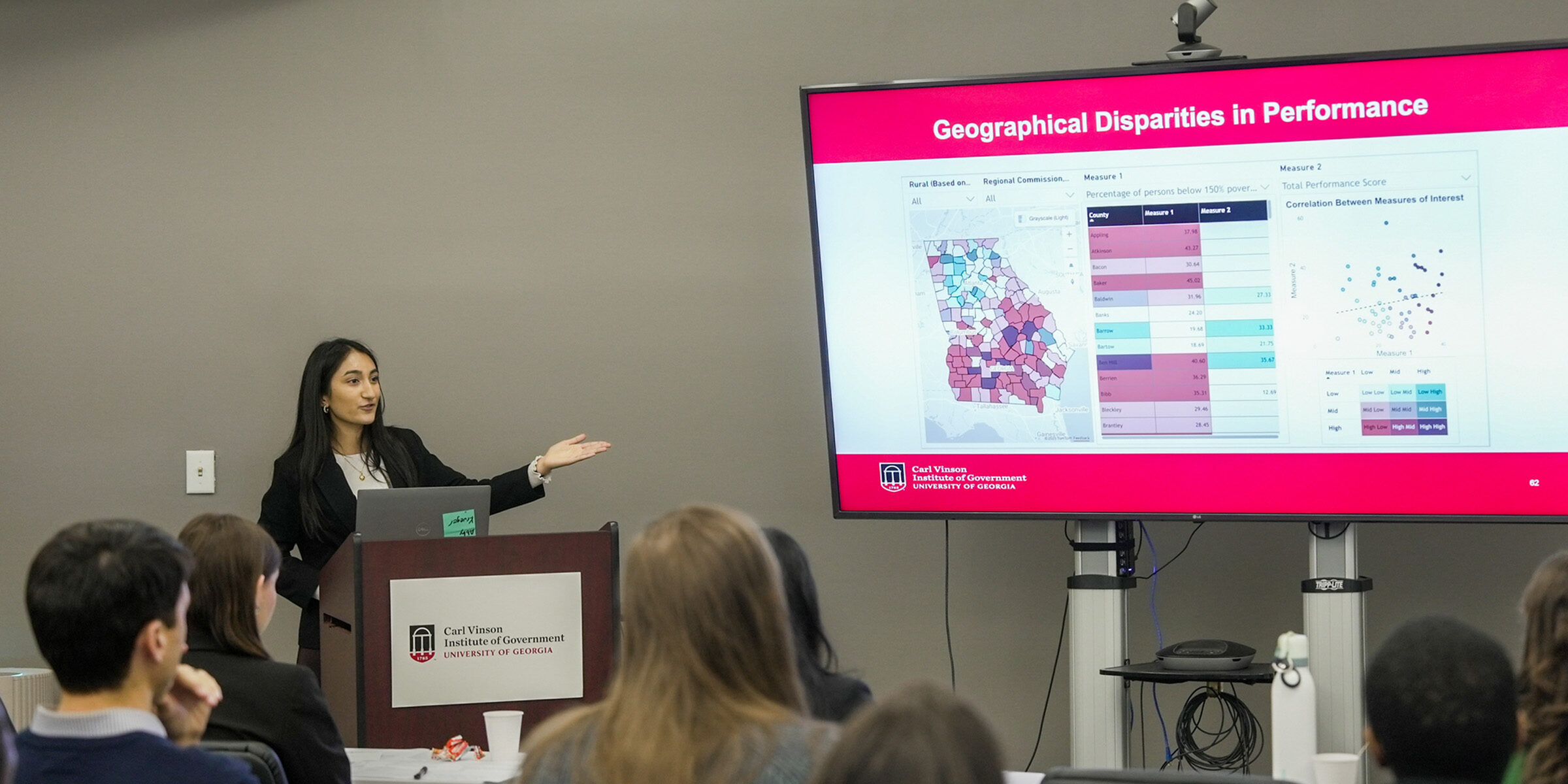 Shriya Garg presents her research findings at the UGA Carl Vinson Institute of Government.