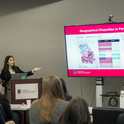 Shriya Garg presents her research findings at the UGA Carl Vinson Institute of Government.