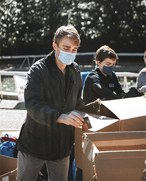 William Ross packing backpacks in Atlanta. 