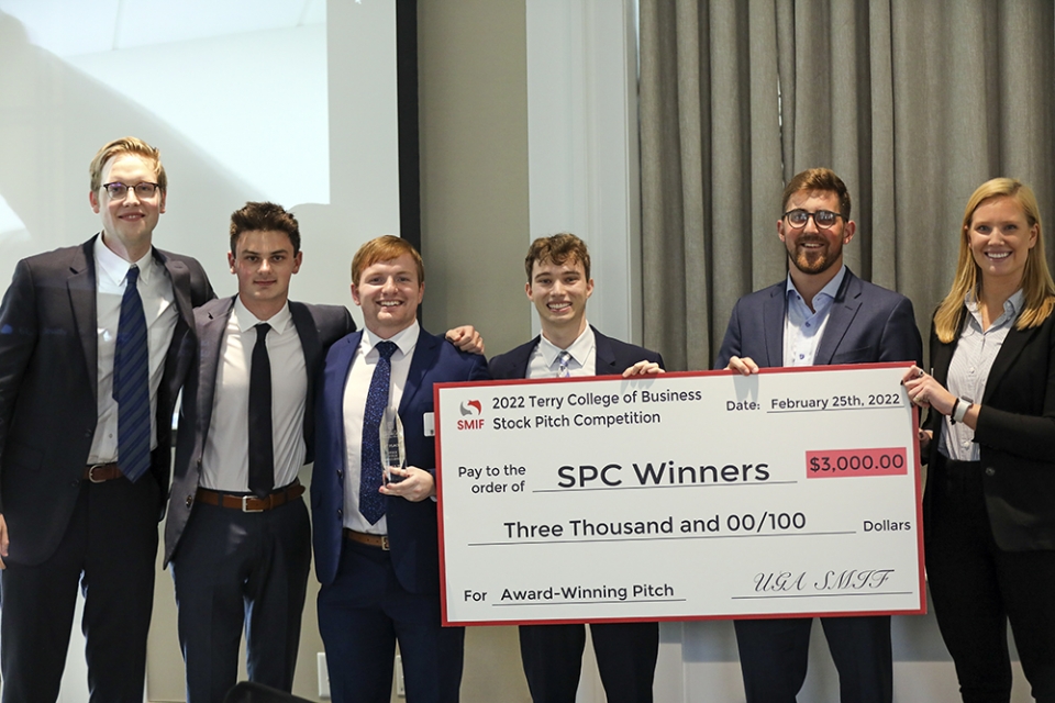 winners of the 2022 UGA Stock Pitch Competition with giant check