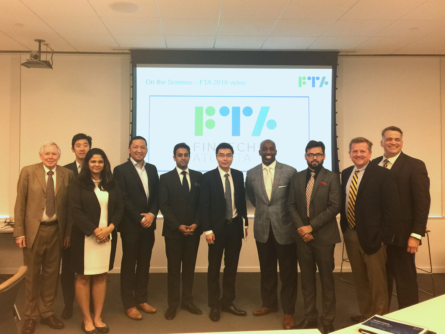 Georgia MBA instructors and students pose for a photo with members of Global Payments at FinTech Atlanta.
