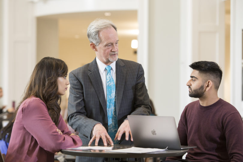 Terry College senior lecturer Mark Huber speaks with students in the Business Learning Community.