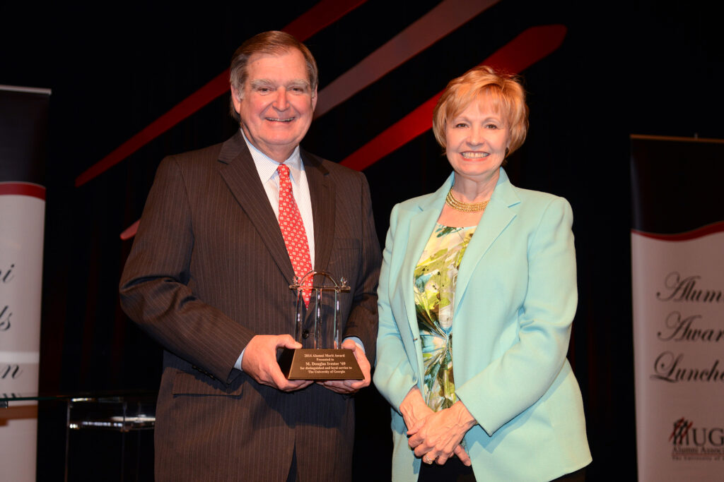 Doug and Kay Ivester pose for a photo at the ceremony for UGA's 2014 Alumni Awards.