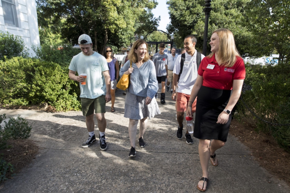 Ivey Tanner leads University of Georgia visitors during a tour of north campus.