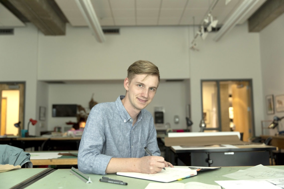 Jackson Mitchell poses for a photo in the Lamar Dodd School of Art