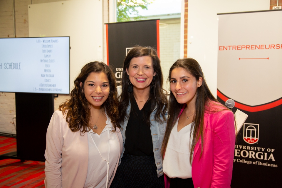 My Travel Closet creators Josefina Rodriguez Sturba (left) and Lee Setty (right) pose with a mentor at Studio 225.