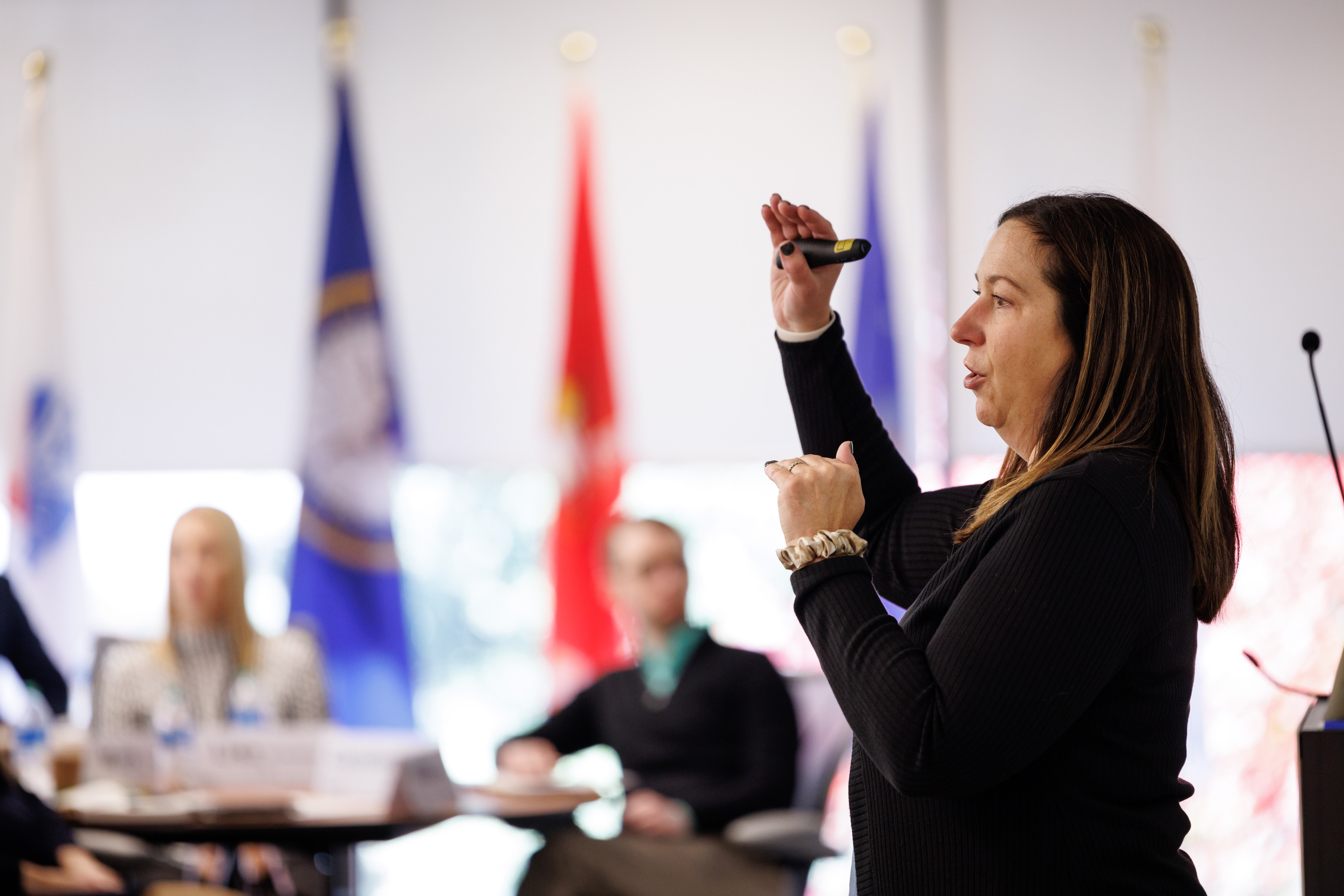 A woman speaks to her audience during an Executive Education class.