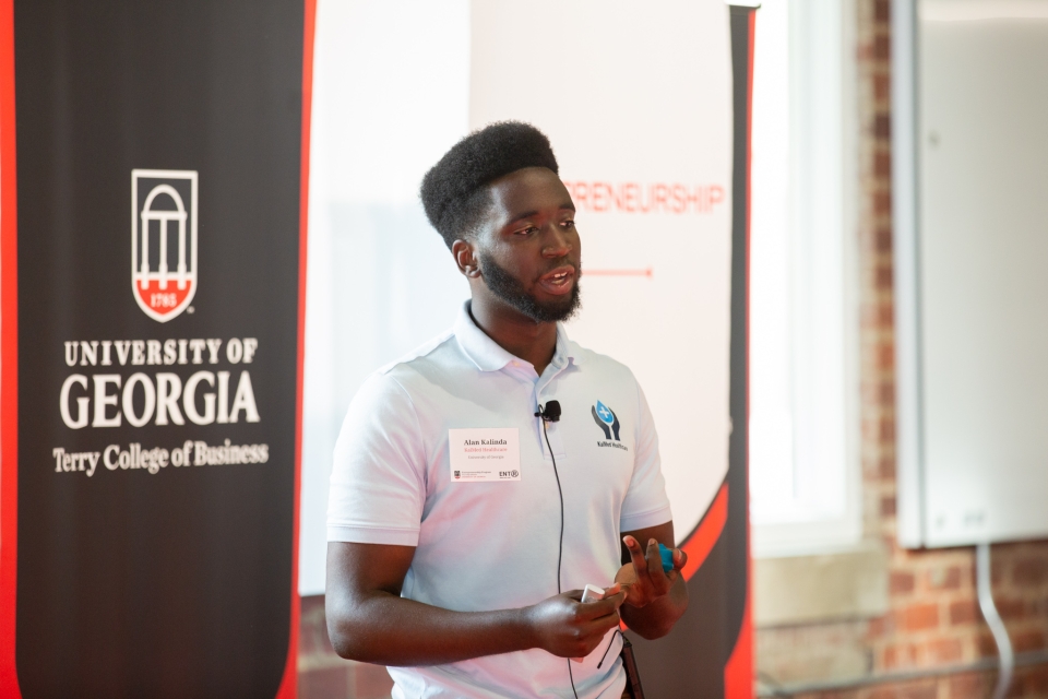 University of Georgia student Alan Kalinda of KalMed Healthcare pitches to the judges during this year's Next Top Entrepreneur. 