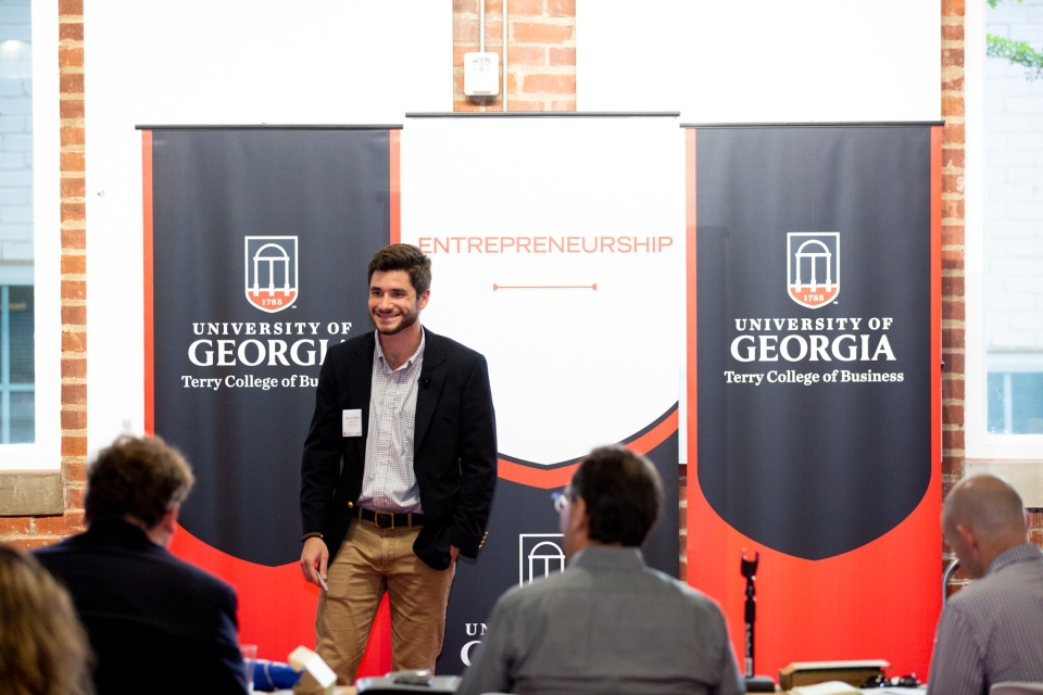 Terry College student Spencer Sutlive pitches his company Rugged Road Outdoors during this year's Next Top Entrepreneur pitch competition. Sutlive's company, which sells outdoor clothing and accessories, took third place.