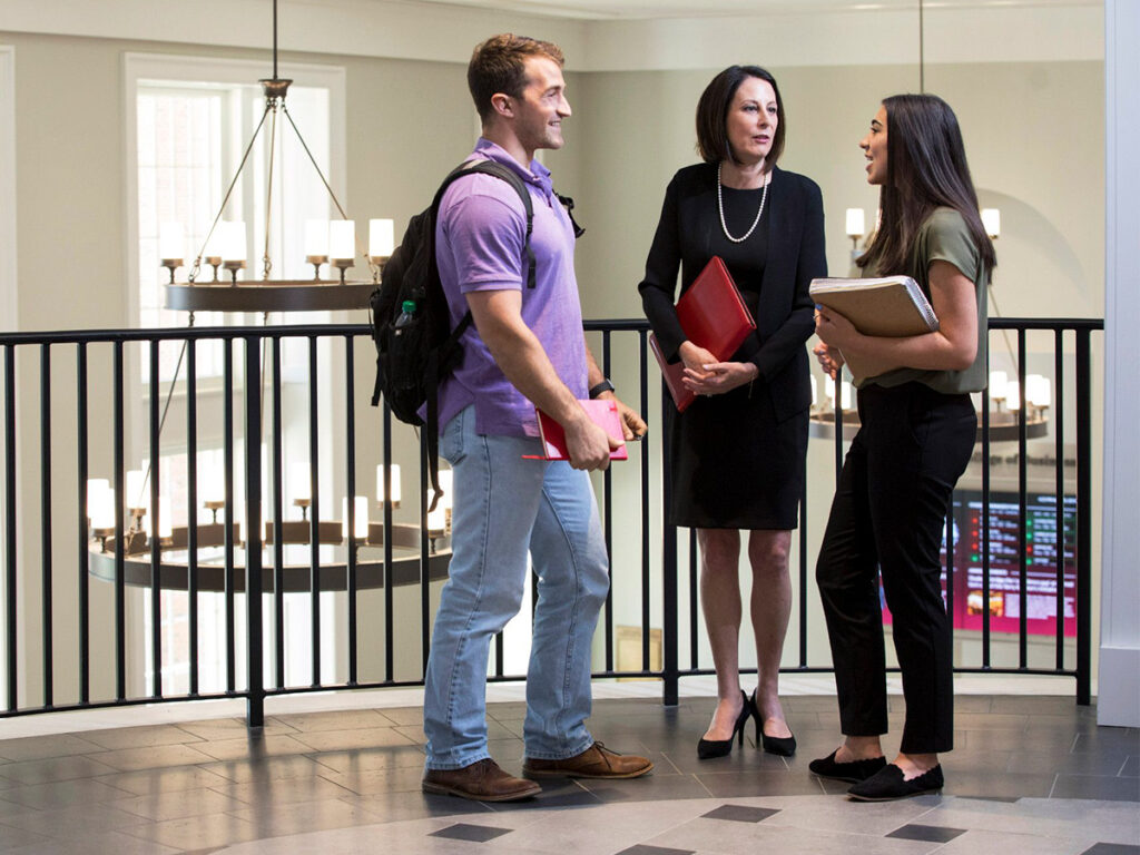 Marisa Pagnatarro speaks with students in Amos Hall