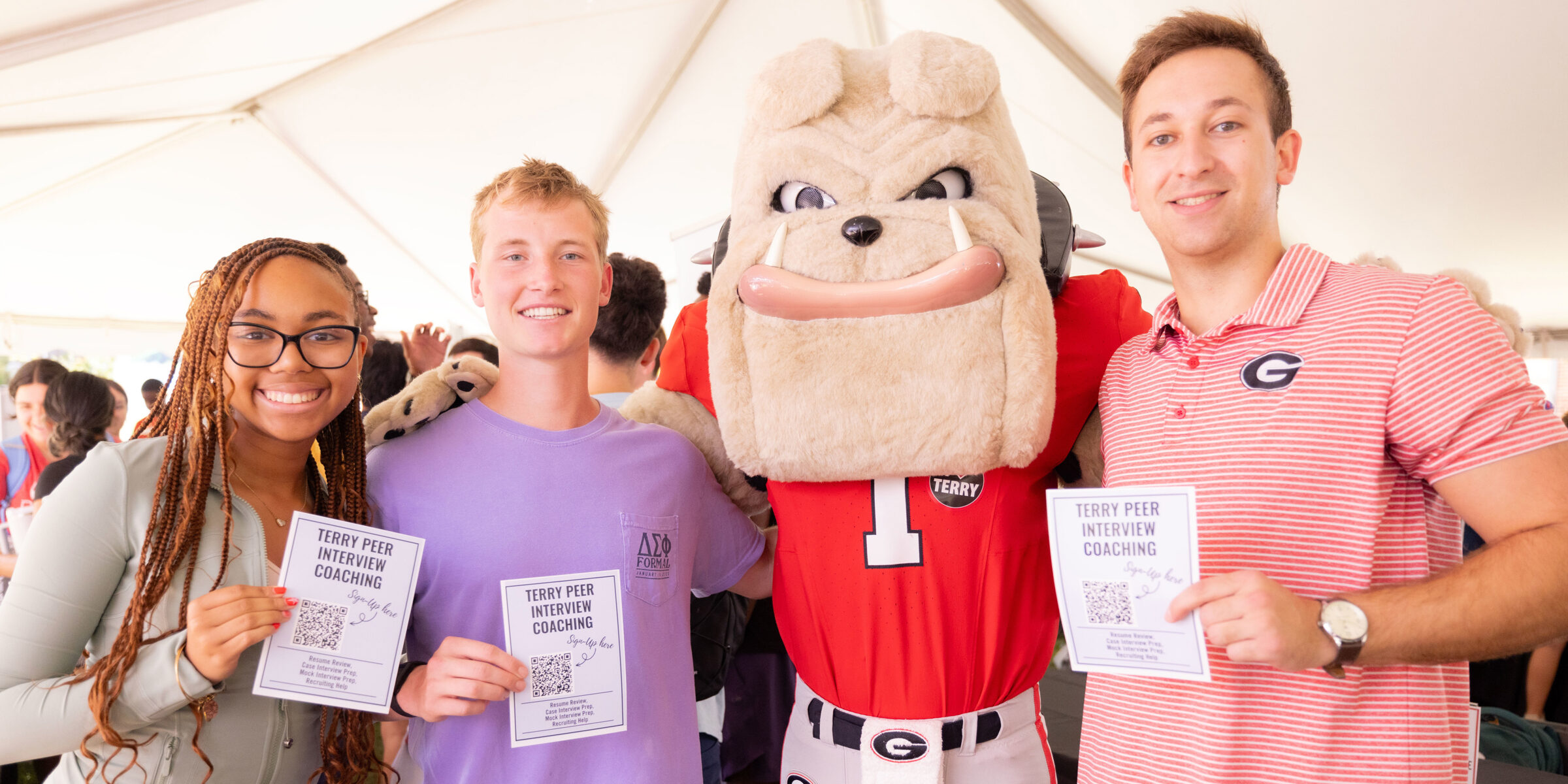 students posing with Hairy Dawg