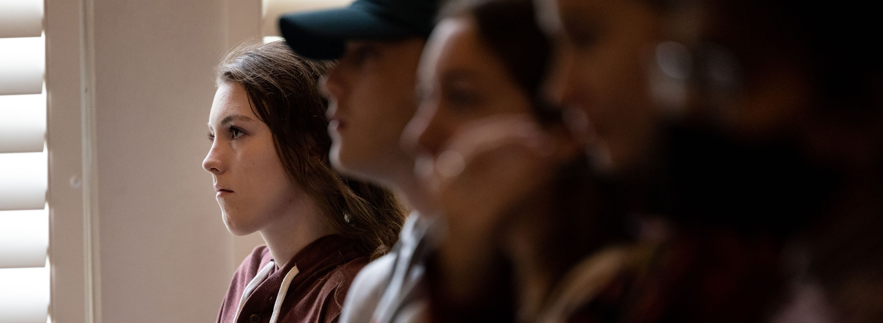 Students listening to speaker series